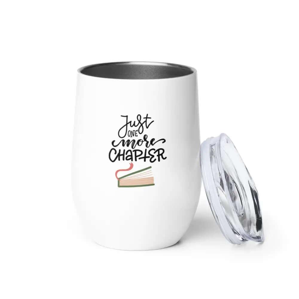 The 12oz Just One More Chapter Wine Tumbler, Travel Mug, features a white stainless steel body, removable clear lid, book illustration, and “Just one more CHAPTER” text—perfect as your personalized outdoor wine glass.