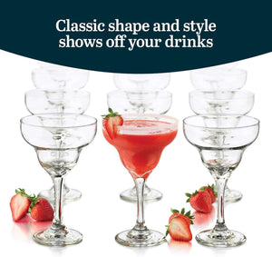 A set of 12 large, durable 9 oz Margarita Glasses is shown, with one filled with a red strawberry drink and garnished with a strawberry, surrounded by fresh strawberries.