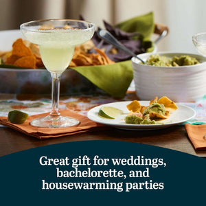 A set of 12 durable 9 oz margarita glasses sits on a table with chips, guacamole, limes, and napkins. Perfect gift for weddings, bachelorette parties, or housewarmings.