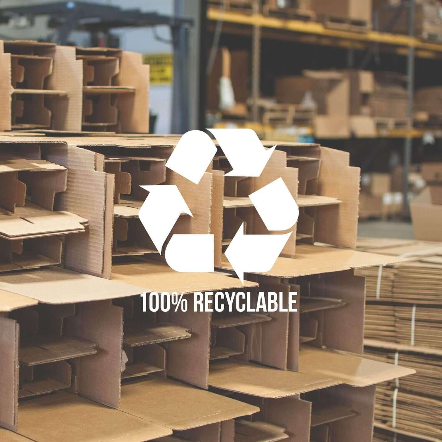 Stacks of cardboard boxes in a warehouse with a 100% recyclable symbol and text overlay in the foreground, ready for shipping Palm Tree Martini Glass sets—stemmed, 10-ounce, lead-free glass (set of 4).