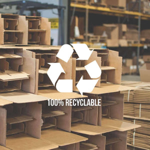 Stacks of cardboard boxes in a warehouse with a 100% recyclable symbol and text overlay in the foreground, ready for shipping Palm Tree Martini Glass sets—stemmed, 10-ounce, lead-free glass (set of 4).