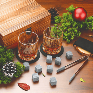 The Macchiaco Whisky Stones Set includes two 10oz whiskey glasses, whiskey stones, tongs, and a wooden gift box—an ideal, thoughtful gift for men and whiskey lovers.