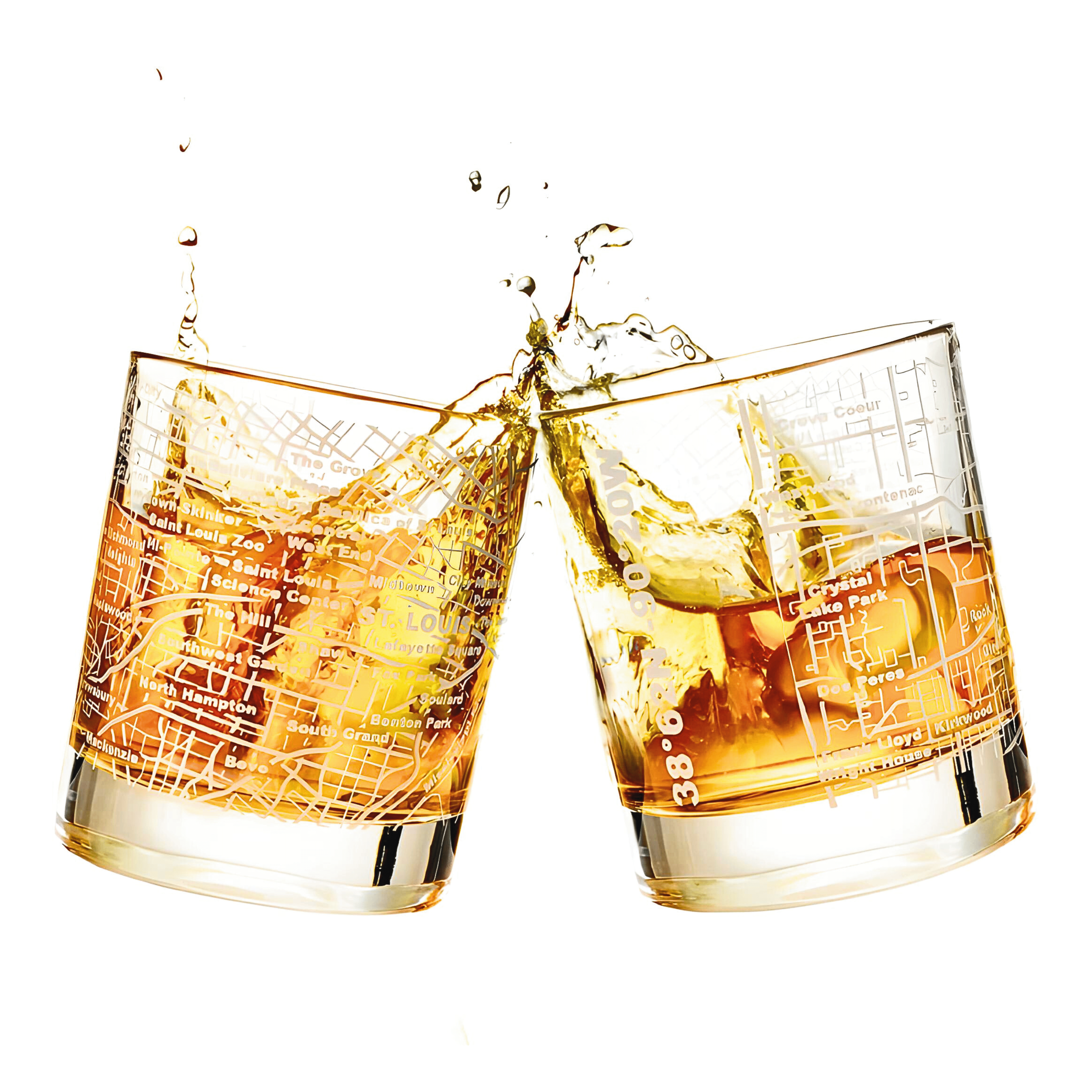 Two 10 oz whiskey glasses from the St Louis Lovers Tumbler Set (set of 2) clink together, splashing liquid and ice against a white background.