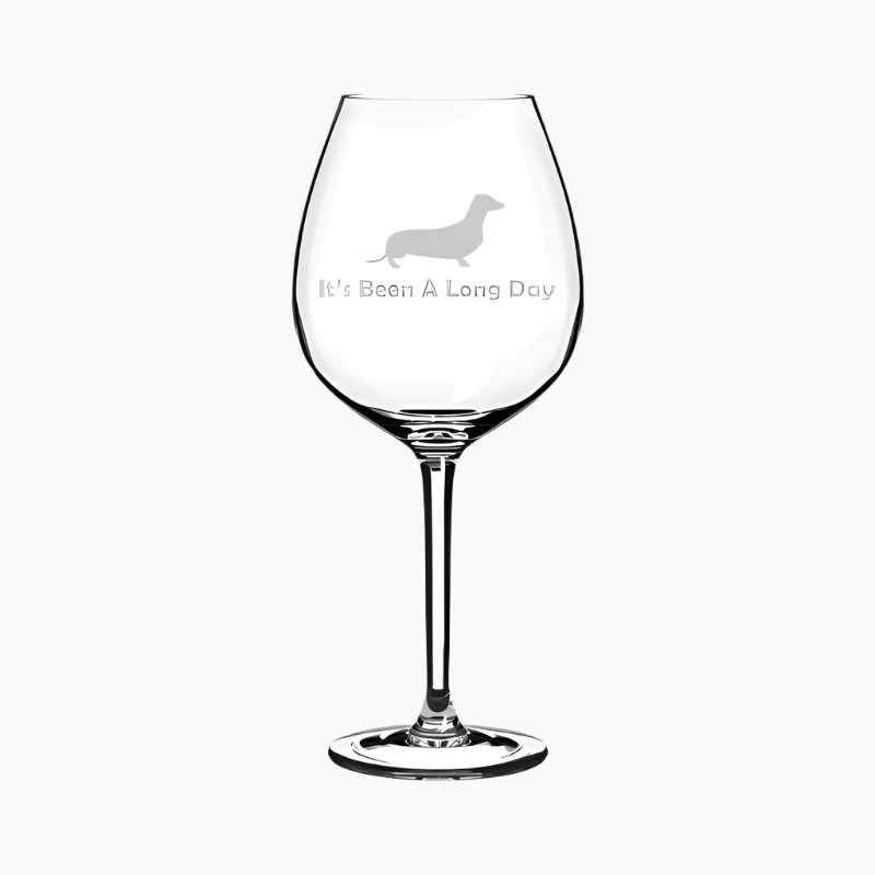 The 20 oz Jumbo Wine Glass Goblet features a funny “It’s Been A Long Day” dachshund design, making it the perfect gift for dog lovers to relax and unwind.