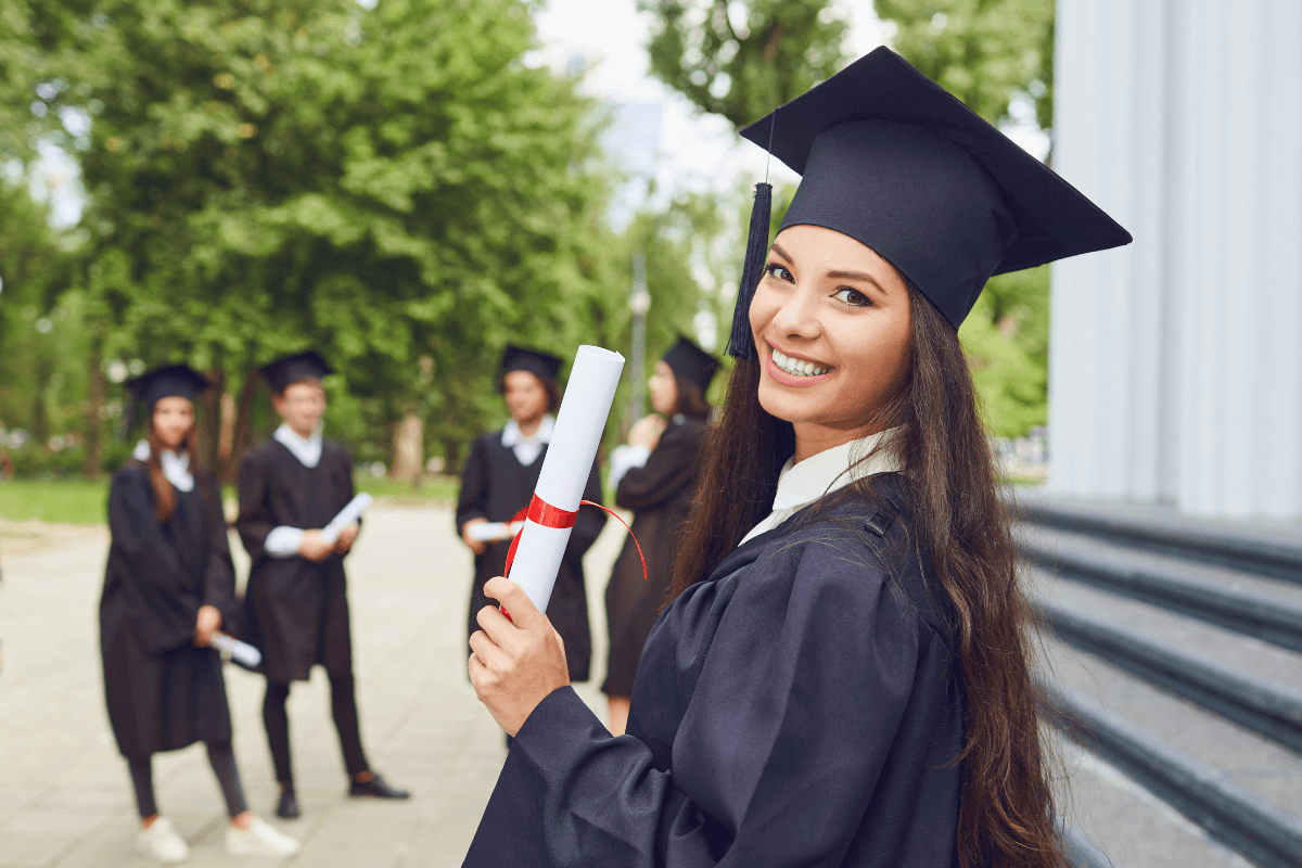 Image of a graduate lady holding diploma