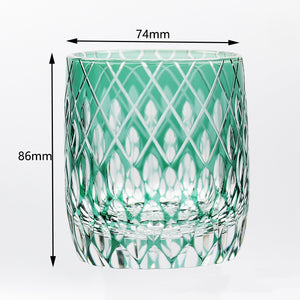 The Macchiaco Fashion Hand Carved Crystal Glass Cup in green features a diamond pattern. Dimensions are shown with arrows: 74mm wide and 86mm tall, set against a plain white background.
