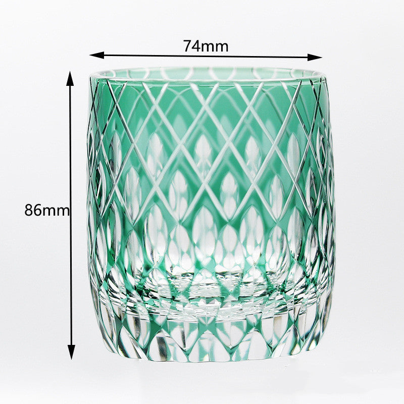 The Macchiaco Fashion Hand Carved Crystal Glass Cup in green features a diamond pattern. Dimensions are shown with arrows: 74mm wide and 86mm tall, set against a plain white background.