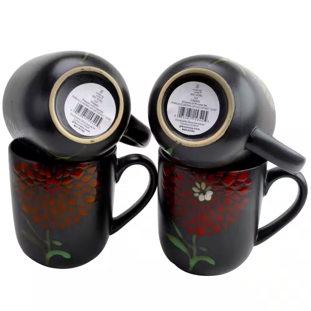Two rustic floral vintage earthenware mugs from the Cafe 4-Piece set are shown stacked, featuring red and white designs with visible barcode labels—perfect 16oz coffee mugs to add to your collection.