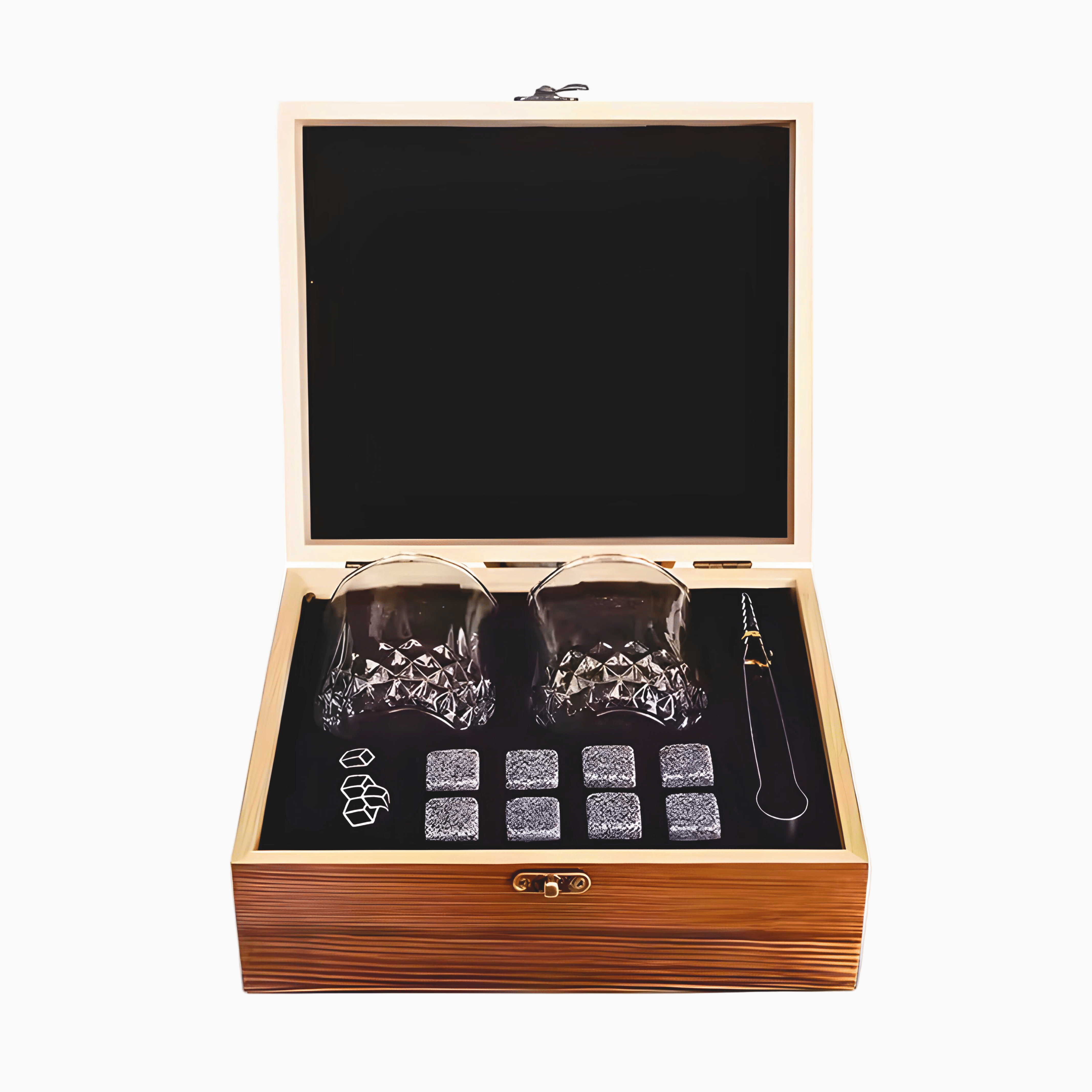 The Macchiaco Whisky Stones Set features two 10oz whiskey glasses, eight whiskey stones, tongs, and a velvet pouch in a chic wooden box—an elegant anniversary gift for him to celebrate special moments.