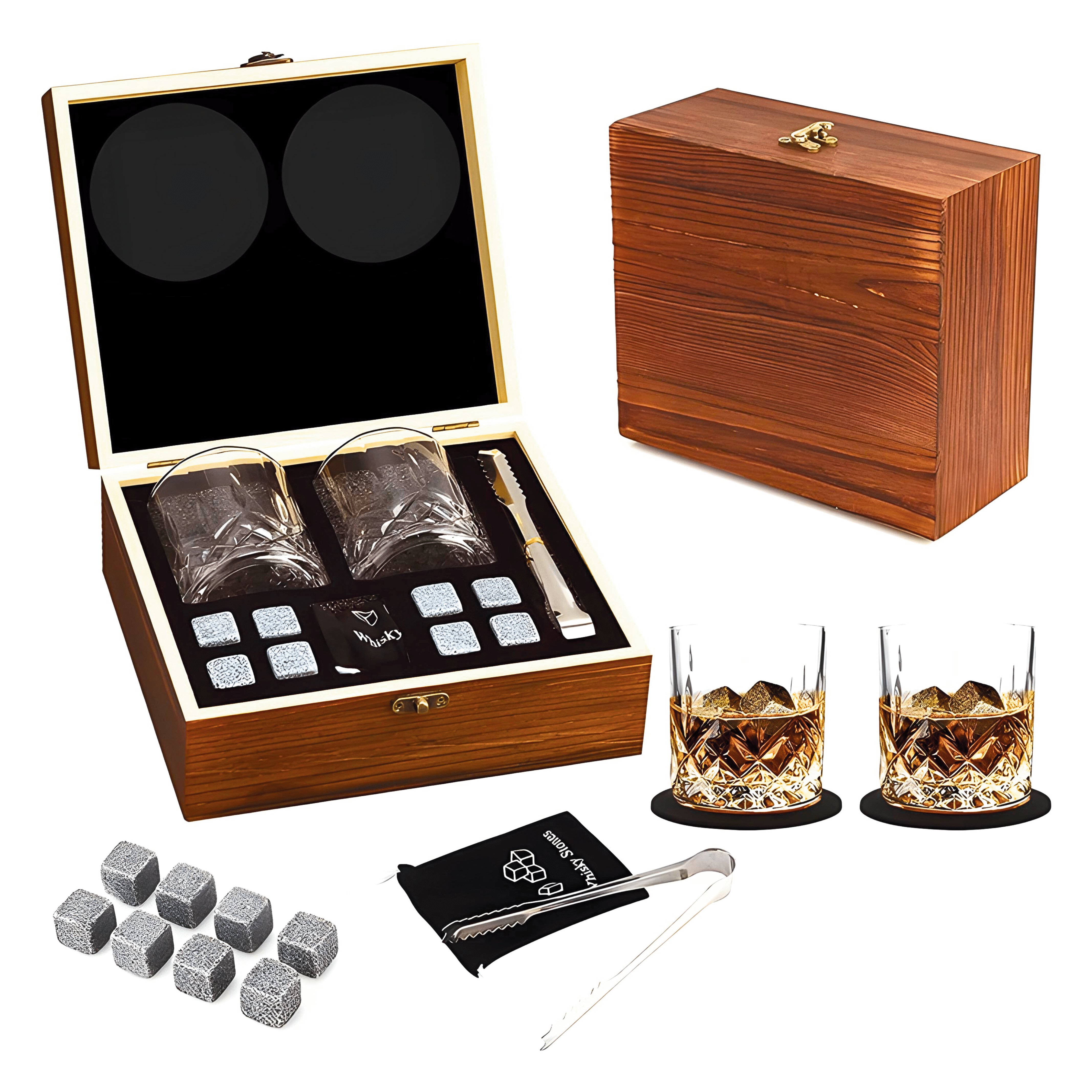 Whiskey glass set with wooden box, glasses, stones, and tools on a white background