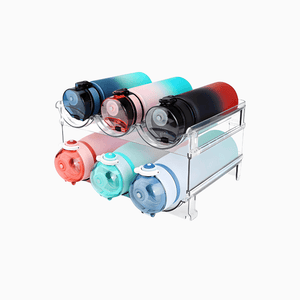 Six BPA-free plastic water bottles in assorted colors are neatly stored on the Water Bottle Storage Organizer—2 packs of clear acrylic, two-tiered racks—perfect for organizing bottles on a plain white background.